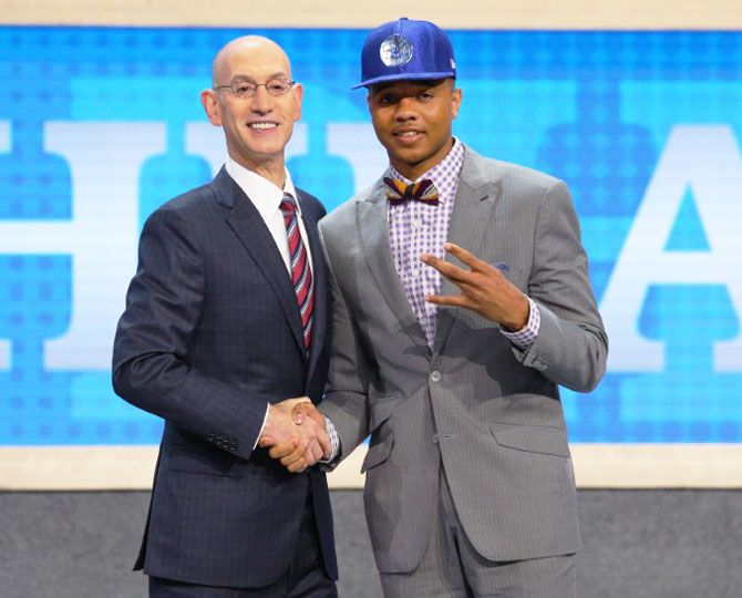 Markelle Fultz (Washington) is introduced by NBA commissioner Adam Silver as the number one overall pick to the Philadelphia 76ers in the first round of the 2017 NBA Draft at Barclays Center in Brooklyn, New York, on Thursday