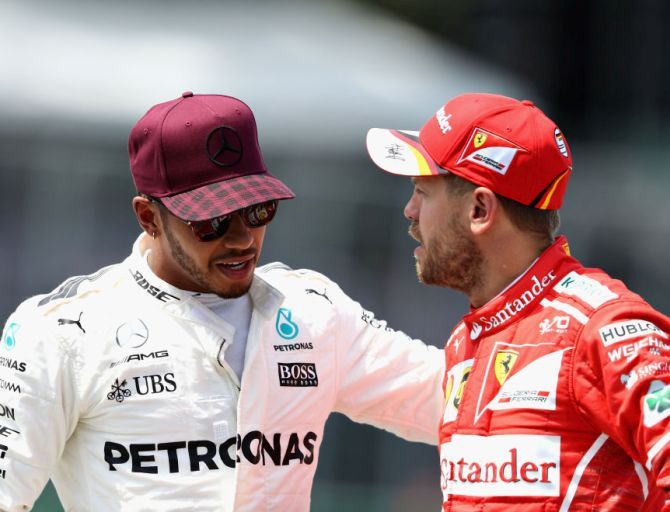 Lewis Hamilton, left, with Sebastian Vettel.