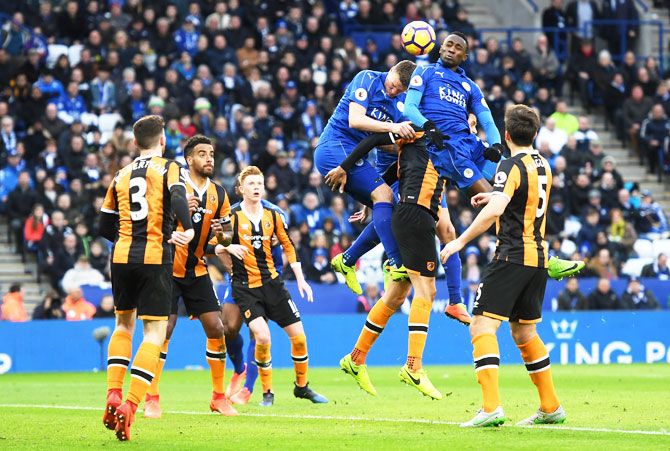 Hull City's Tom Huddlestone (centre) deflects Leicester City's Wilfred Ndidi's (right) header into his own net for the latter's third goal