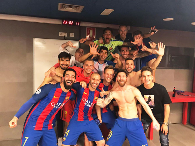 The ecstatic bunch of FC Barcelona players celebrate in the dressing room after their miraculous win on Wednesday