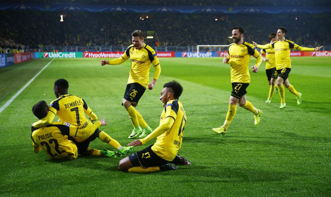 Borussia Dortmund's Christian Pulisic celebrates scoring their second goal with teammates