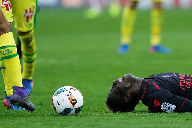 Nice's Mario Balotelli reacts during their France Ligue 1 match against FC Nantes at the La Beaujoire Stadium in Nantes on Saturday