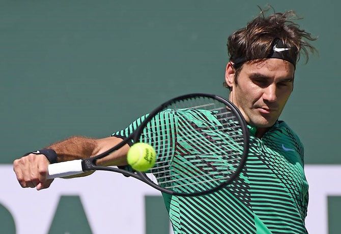 Roger Federer plays a backhand return during his semi-final win over Jack Sock in the BNP Paribas Open at the Indian Wells Tennis Garden on Saturday