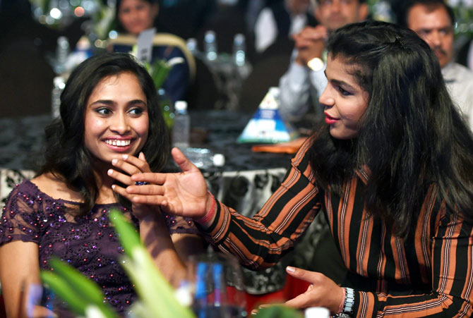 Dipa Karmakar and Sakshi Malik get chatty during the TOISA Awards in Mumbai on Monday, March 20