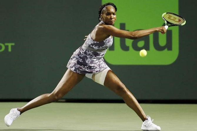 USA's Venus Williams plays a backhand return during her second round match against Brazil's Beatriz Haddad-Maia on Saturday