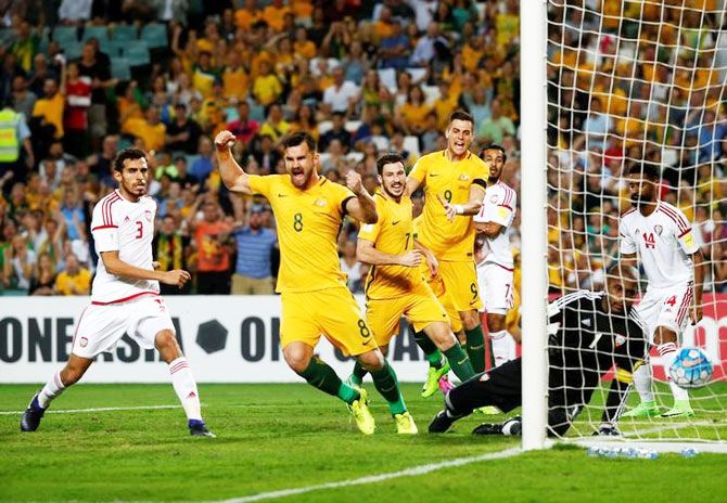 Australia's Bailey Wright, Mathew Leckie and Tomi Juric celebrate after teammate Jackson Irvine scores against the UAE during the 2018 World Cup Qualifying Asian Zone, Group B match at Sydney Football Stadium, Sydney, on Tuesday