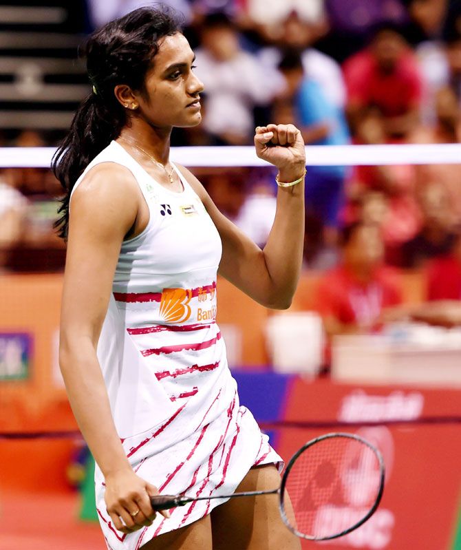 India's PV Sindhu celebrates a point during during her match against Japan's Kawakami Saena during the Women's singles match at the Yonex Sunrise India Open 2017 in New Delhi on Thursday