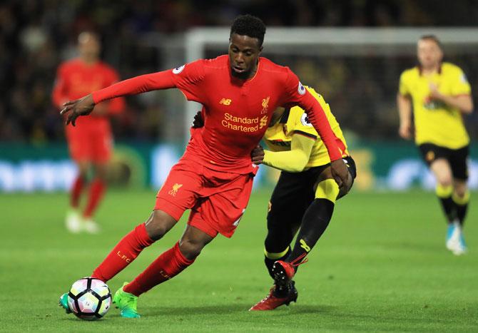 Liverpool's Divock Origi goes past Watford's Christian Kabasele