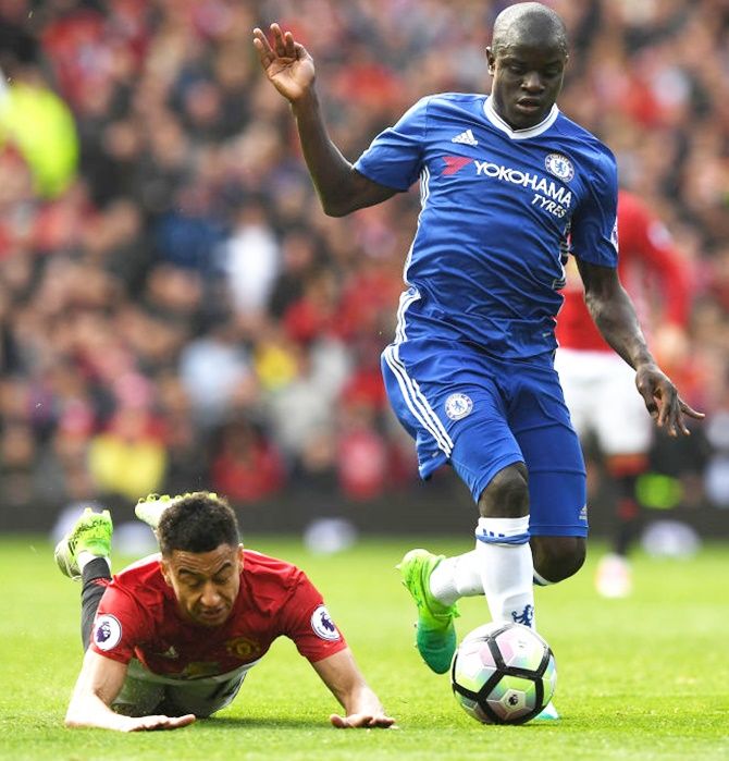 Chelsea's N'Golo Kante (right) battles for the ball with Manchester United's Jesse Lingard