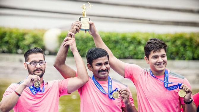 Debutant Amanjeet Singh, Raju Chinna Srither and Abhishek Verma on the podium after winning the gold medal in the Compound Team event at the Archery World Cup in Shanghai on Saturday