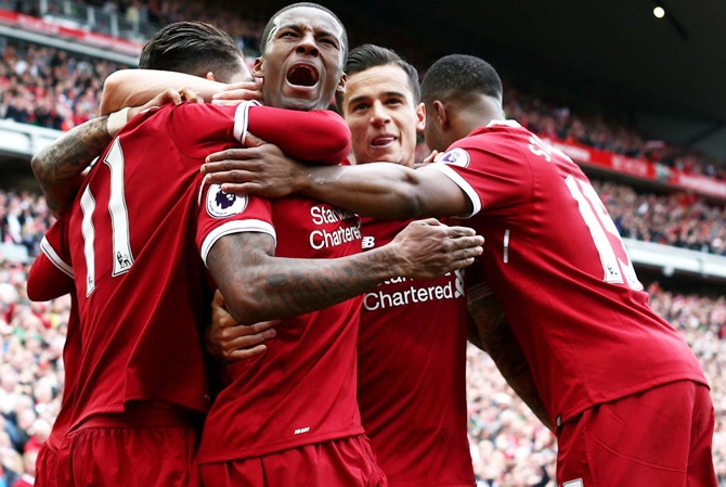 Georginio Wijnaldum of Liverpool celebrates scoring