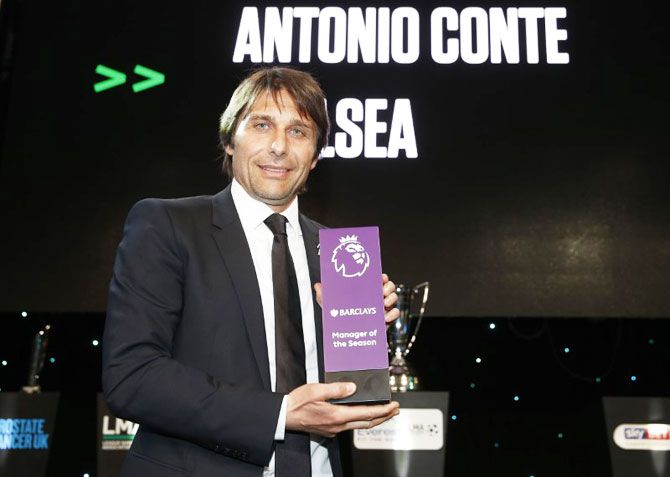 Chelsea manager Antonio Conte poses with the Barclays Premier League Manager Of The Season award at the League Managers Association Annual Awards Dinner at The Grosvenor House Hotel in London on Monday