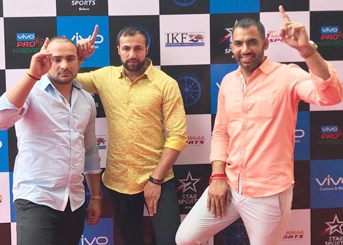 From left, Manjeet Chhillar, Rakesh Kumar, Anup Kumar at the PKL Auction