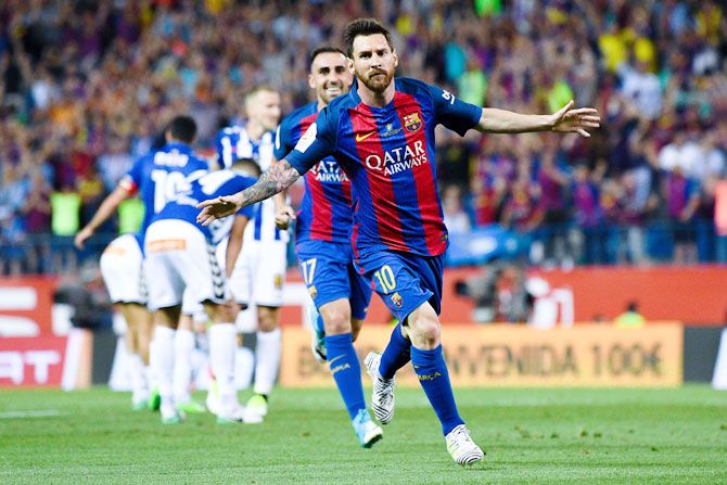 FC Barcelona's Lionel Messi celebrates after scoring his team's opening goal at the Copa Del Rey final against Deportivo Alaves at Vicente Calderon stadium in Madrid on Saturday