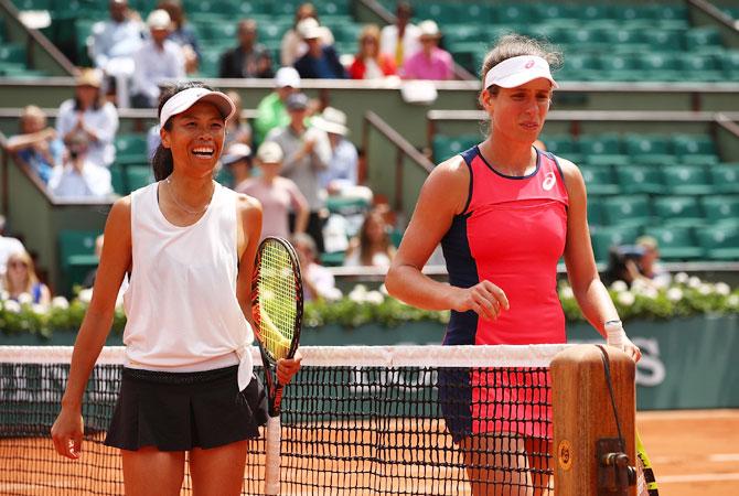 Great Britain's Johanna Konta and Taipei's Su-Wei Hsieh walk off court following their first round match