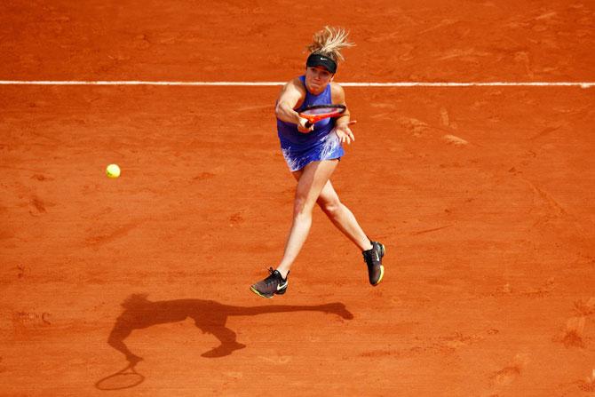 Ukraine's Elina Svitolina plays a forehand during her first round match against Kazhakstan's Yaroslava Shvedova