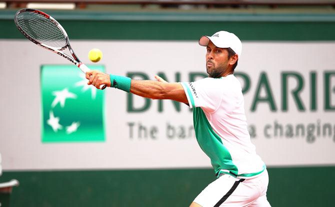 Spain's Fernando Verdasco hits a backhand during the first round match against Germany's Alexander Zverev