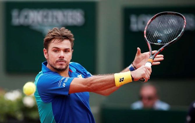 Switzerland's Stan Wawrinka in action during his first round match against Slovakia's Jozef Kovalik
