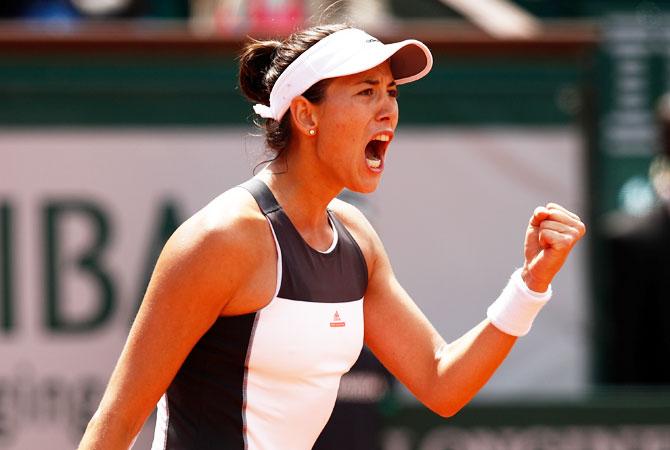 Spain's Garbine Muguruza celebrates winning a point during the second round match against Estonia's Anett Kontaveit