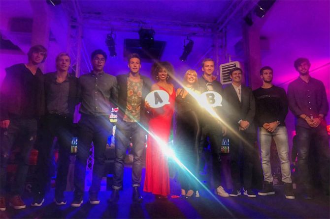 Players pose with models at the Next Gen Finals draw ceremony on Sunday