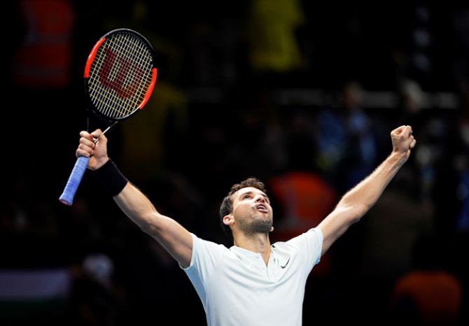 Bulgaria's Grigor Dimitrov celebrates winning his ATP World Tour Finals group stage match against Belgium's David Goffin at the O2 Arena in London on Wednesday