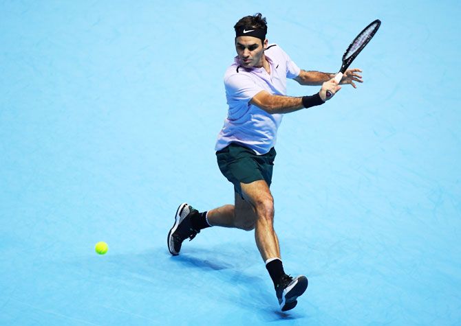 Switzerland's Roger Federer in action during his group stage match against Croatia's Marin Cilic at the ATP Tour Finals at the O2 Arena in London on Thursday