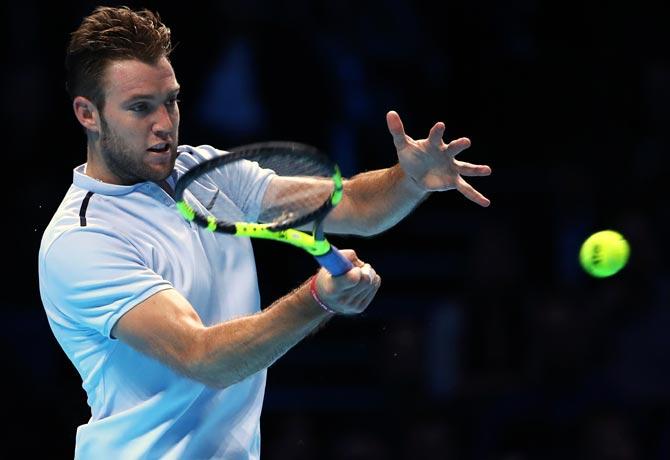 American Jack Sock hits a forehand