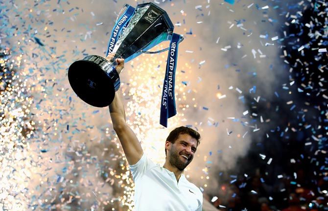 Grigor Dimitrov celebrates after winning the 2017 ATP World Tour Finals in London on Sunday