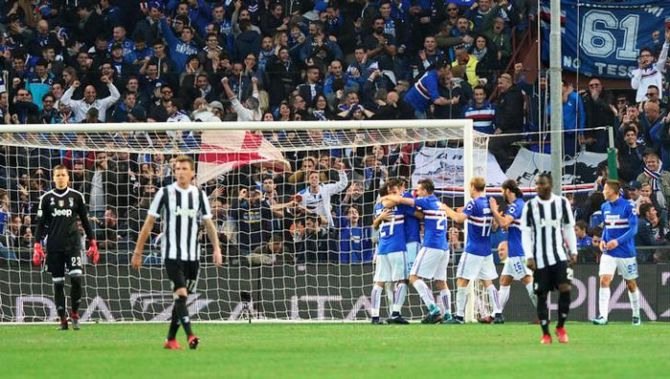 Juventus’ Wojciech Szczesny and teammates are dejected as Sampdoria celebrate their third goal during their Serie A match at Stadio Comunale Luigi Ferraris, in Genoa, Italy on Sunday