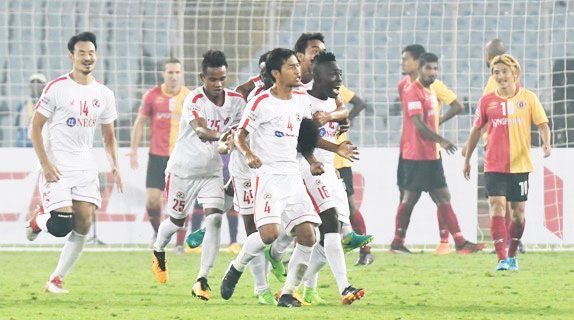 Aizawl FC William Lalnunfela celebrates with teammates after scoring the winning goal against East Bengal during their I League match in Kolkata on Tuesday