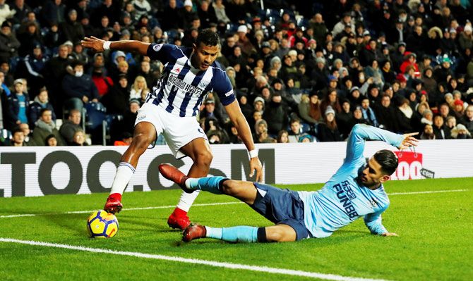 West Bromwich Albion's Salomon Rondon and Newcastle United's Ayoze Perez vie for possession during their match at The Hawthorns, in West Bromwich on Tuesday