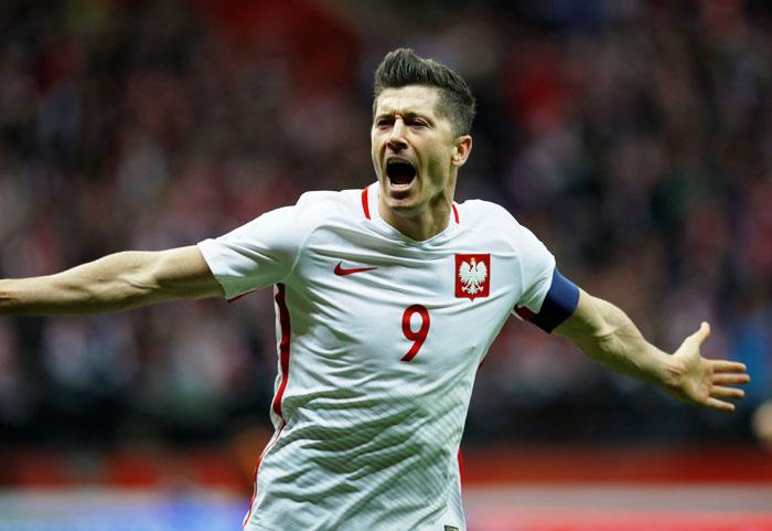 Poland’s Robert Lewandowski celebrates scoring their third goal against Montenegro during their 2018 World Cup qualifiers at National Stadium Warsaw in Warsaw, Poland on Sunday