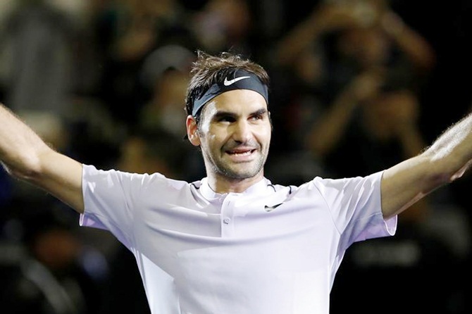 Switzerland’s Roger Federer celebrates after beating Spain’s Rafael Nadal in the final of the Shanghai Masters 