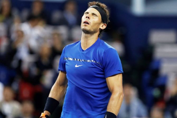 Rafael Nadal reacts after missing a point during the Shanghai Masters final