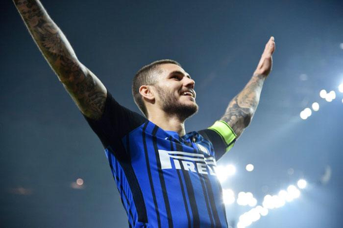 Inter Milan's Mauro Icardi celebrates scoring their first goal against AC Milan during their Serie A derby at San Siro in Milan on Sunday