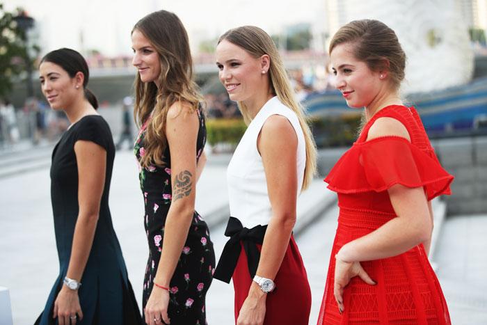 (Left to Right) Spain's Garbine Muguruza, Czech Republic's Karolina Pliskova, Denmark's Caroline Wozniacki and Latvia's Jelena Ostapenko pose prior to the BNP Paribas WTA Finals Singapore in Singapore on Friday