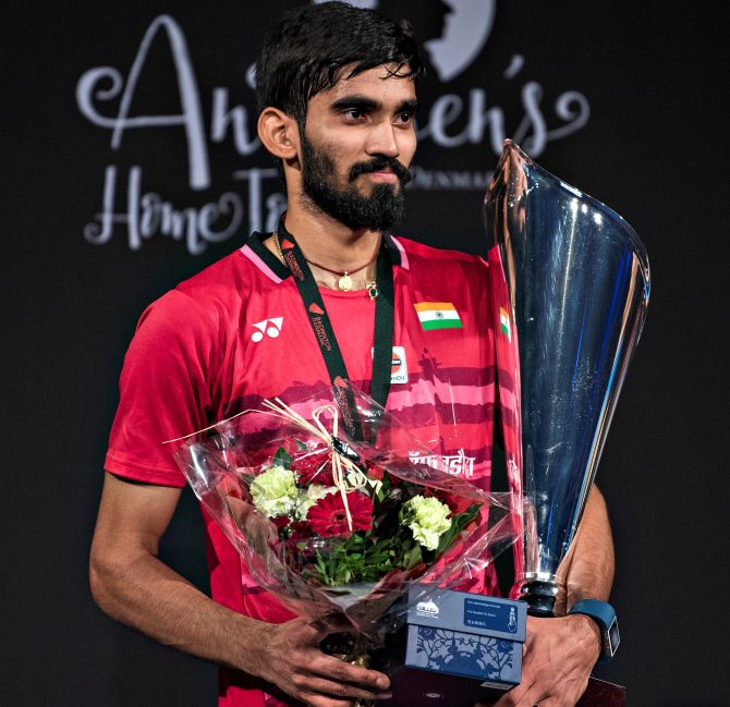 Kidambi Srikanth poses with the trophy after winning the Debmark Open men's singles title. Photograph: Scanpix Denmark/Claus Fisker via Reuters