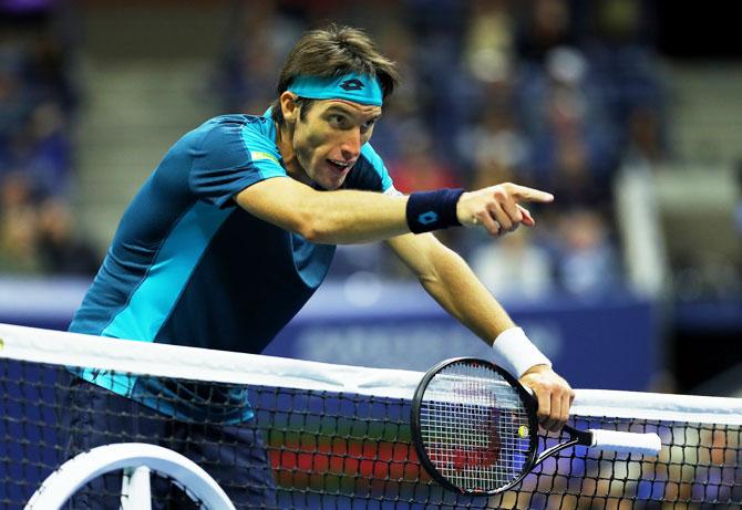 Leonardo Mayer reacts during his third round match against Rafael Nadal