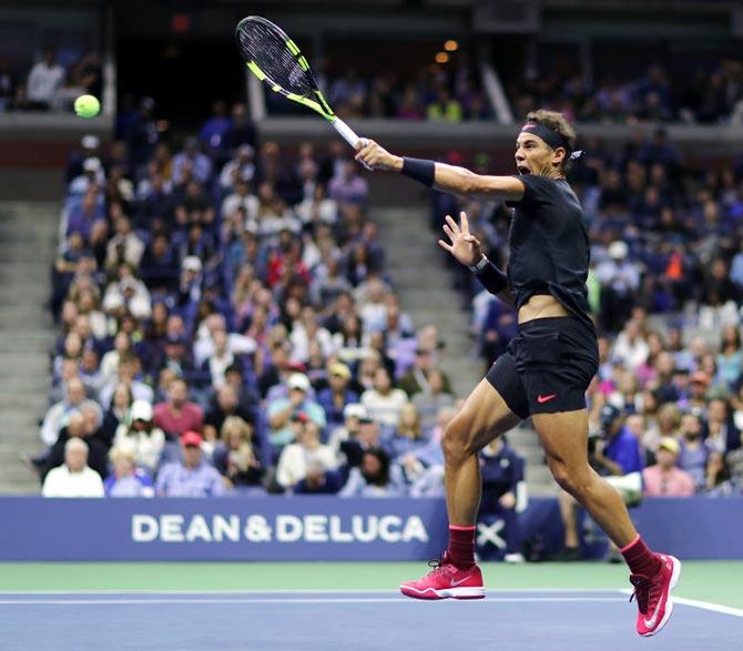 Rafael Nadal plays a forehand return against Juan Martin del Potro