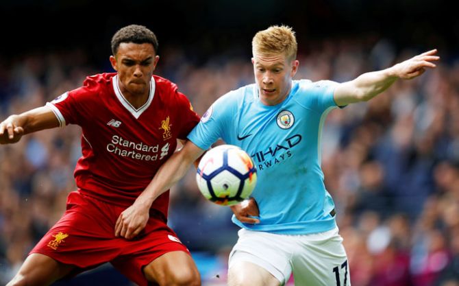 Manchester City's Kevin De Bruyne in action with Liverpool's Trent Alexander-Arnold during their EPL match on Saturday