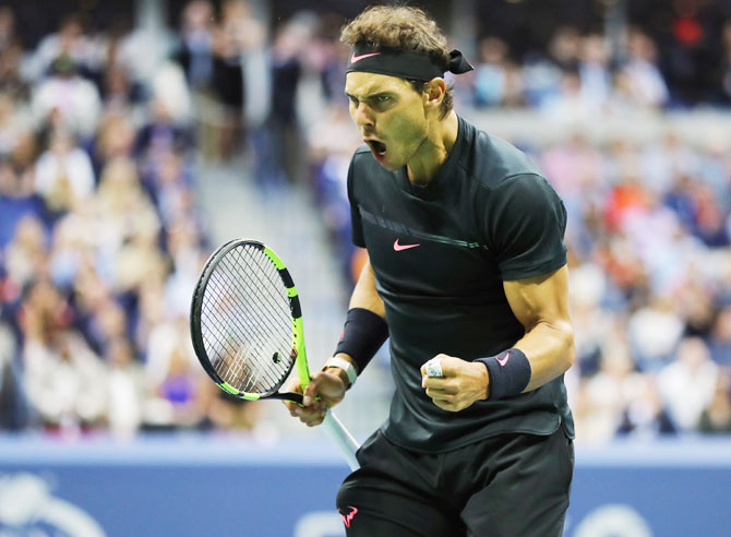 Spain's Rafael Nadal reacts on winning a point against South Africa's Kevin Anderson during their US Open final on Day Fourteen of the 2017 US Open at the USTA Billie Jean King National Tennis Center in the Flushing neighborhood of the Queens borough of New York City on Sunday