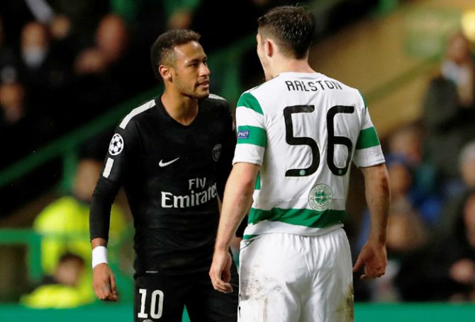 Paris Saint-Germain’s Neymar clashes with Celtic’s Anthony Ralston during their match at Celtic Park on Tuesday