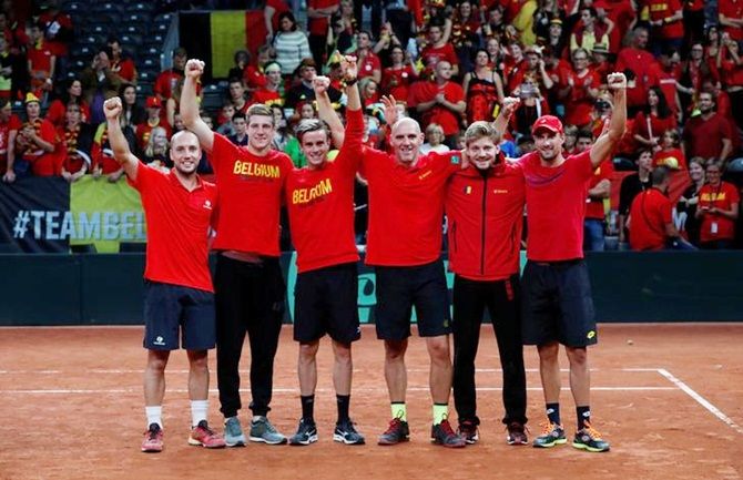  Belgium's David Goffin and Steve Darcis celebrate with teammates after winning the Davis Cup semi-final against Australia in Sept 17