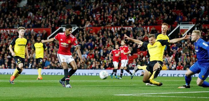 Marcus Rashford celebrates after scoring