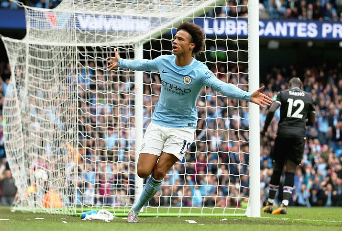 Manchester City's Leroy Sane celebrates scoring the first goal against Crystal Palace at Etihad Stadium