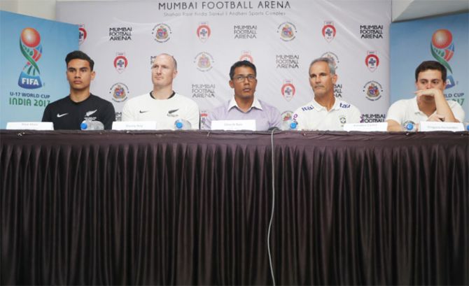 New Zealand Under-17 captain Max Mata (left to right), New Zealand coach Danny Hay, former India footballer Dinesh Nair, Brazil's Under-17 coach Carlos Amedeu and communications officer of the Brazilian squad
