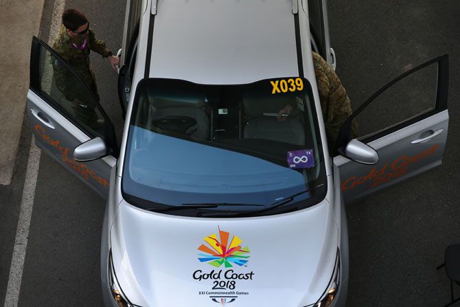 Australia military personnel check a vehicle at The Gold Coast Convention & Exhibition Centre in Australia