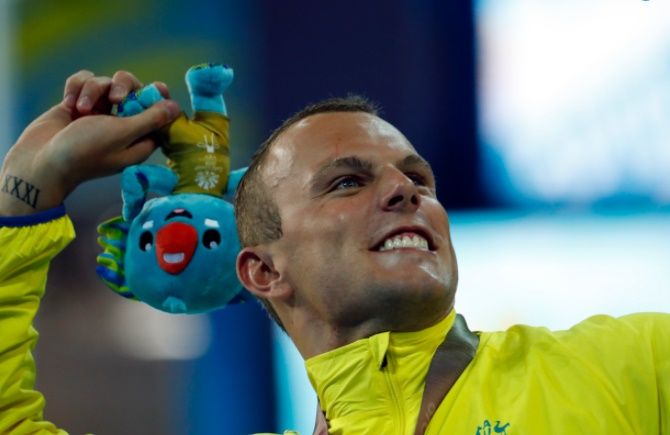  Australia’s Kyle Chalmers celebrates winning the men's 200m freestyle gold at Optus Aquatic Centre