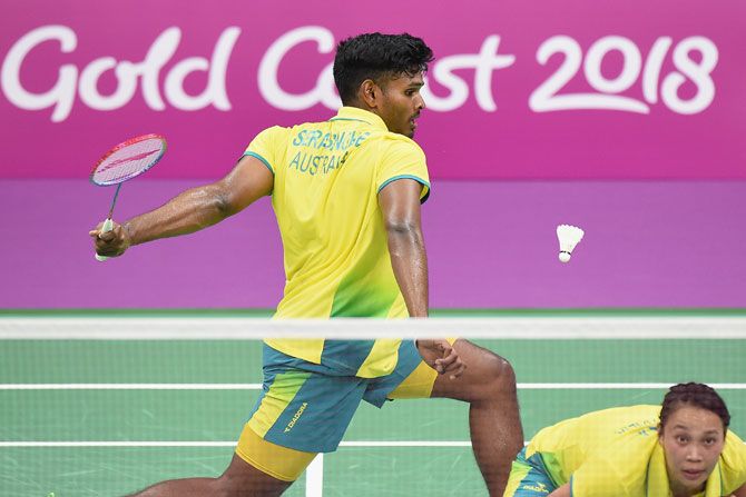 Australia’s Sawan Serasinghe (left) and his mixed doubles partner Setyana Mapasa compete during the badminton mixed team group stage match against England at Carrara Sports and Leisure Centre 