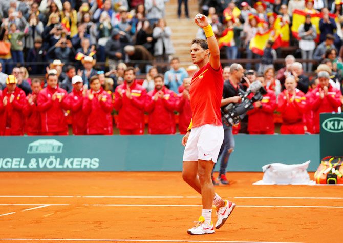 Spain's Rafael Nadal celebrates winning his Davis Cup quarter-final match against Germany's Philipp Kohlschreiber at Plaza de Toros de Valencia, in Valencia on Friday
